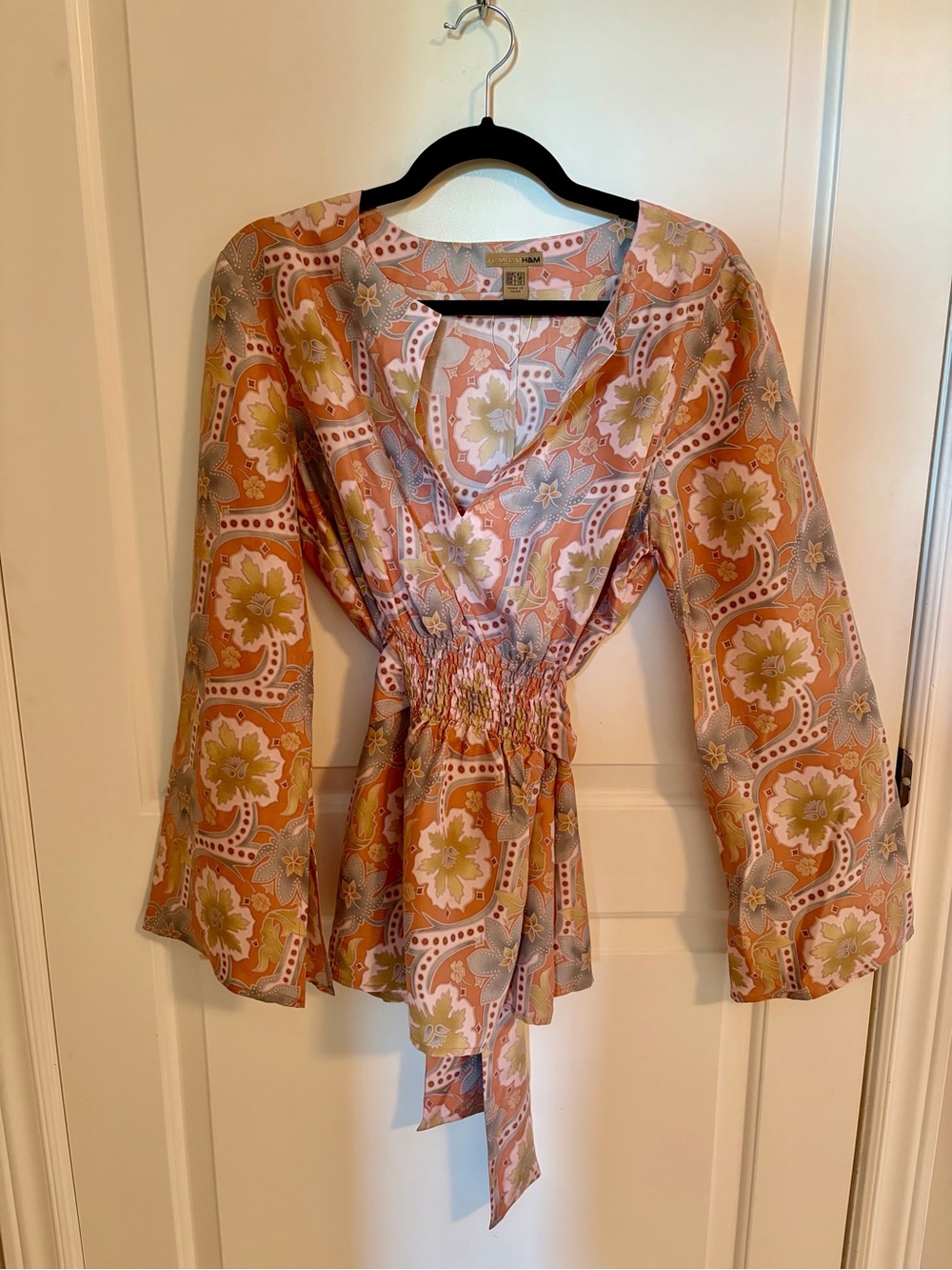H&M floral silk blouse in dusty pink, green and blue.